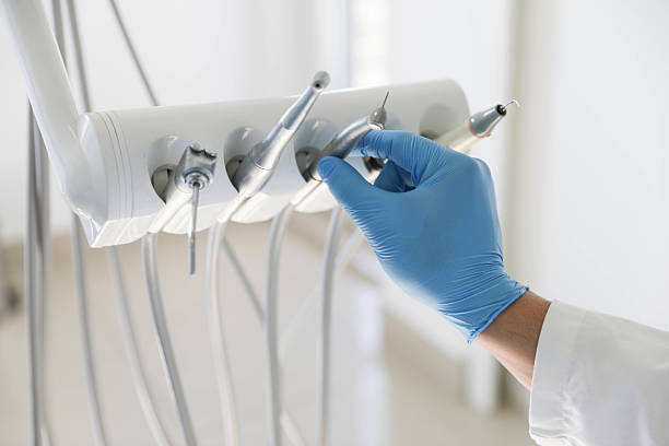 Professional Tooth Extraction technician working in White Hall, WV